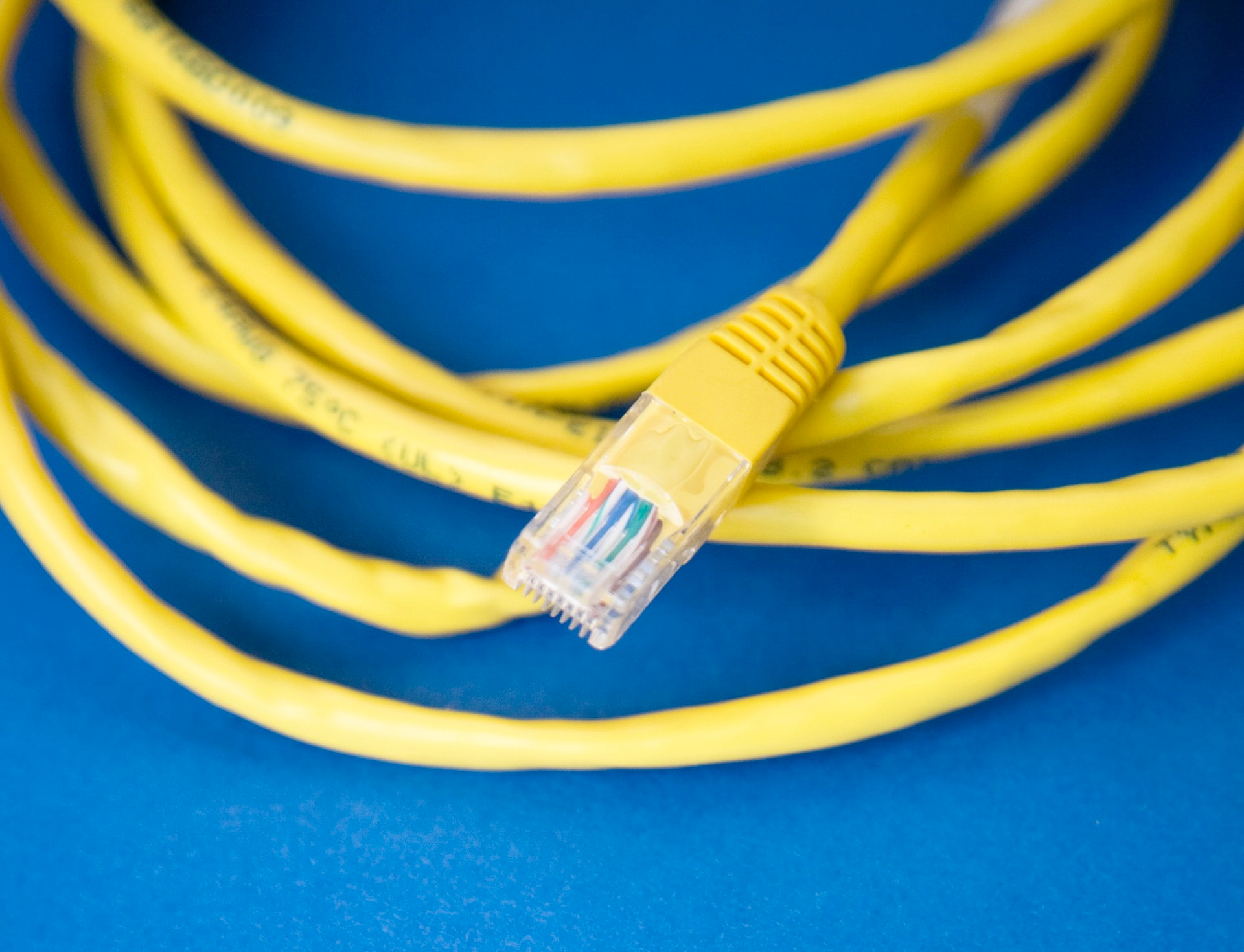 A yellow unplugged ethernet cord